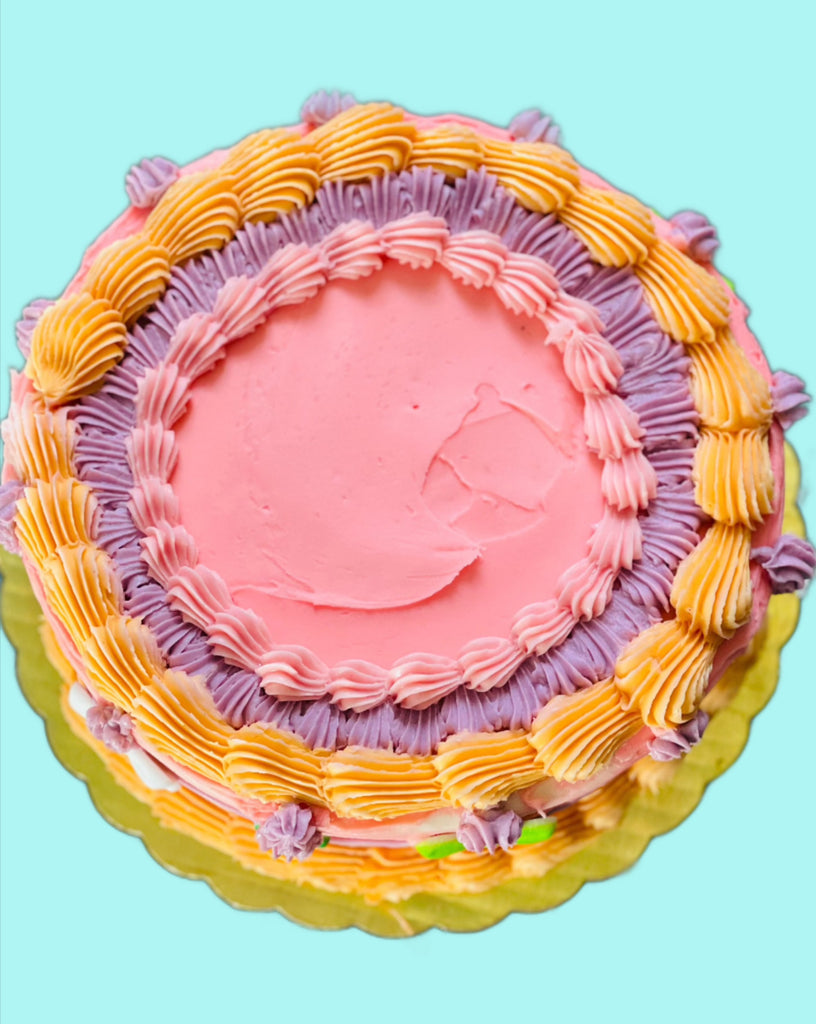 photo of colorful frosted cake