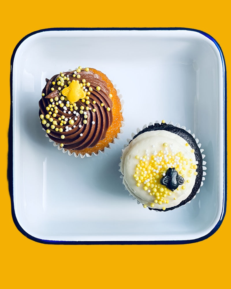 mini cupcakes with bee candies on top