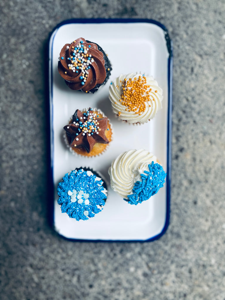 selection of 5 cupcakes decorated for Hanukkah