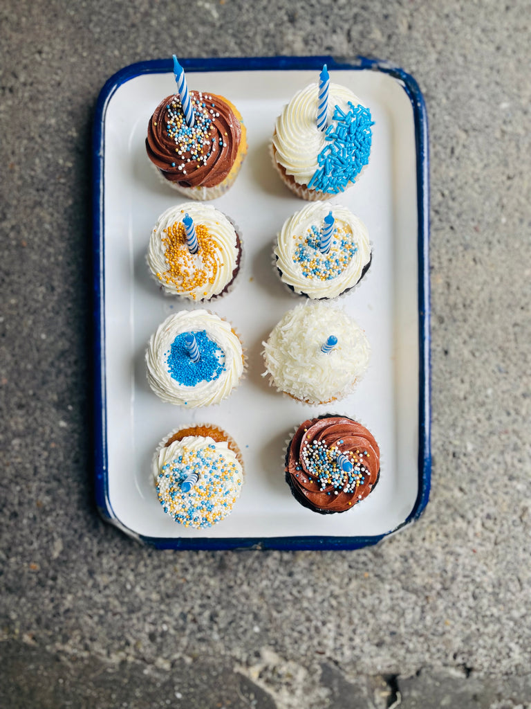 selection of 8 cupcakes decorated for Hanukkah