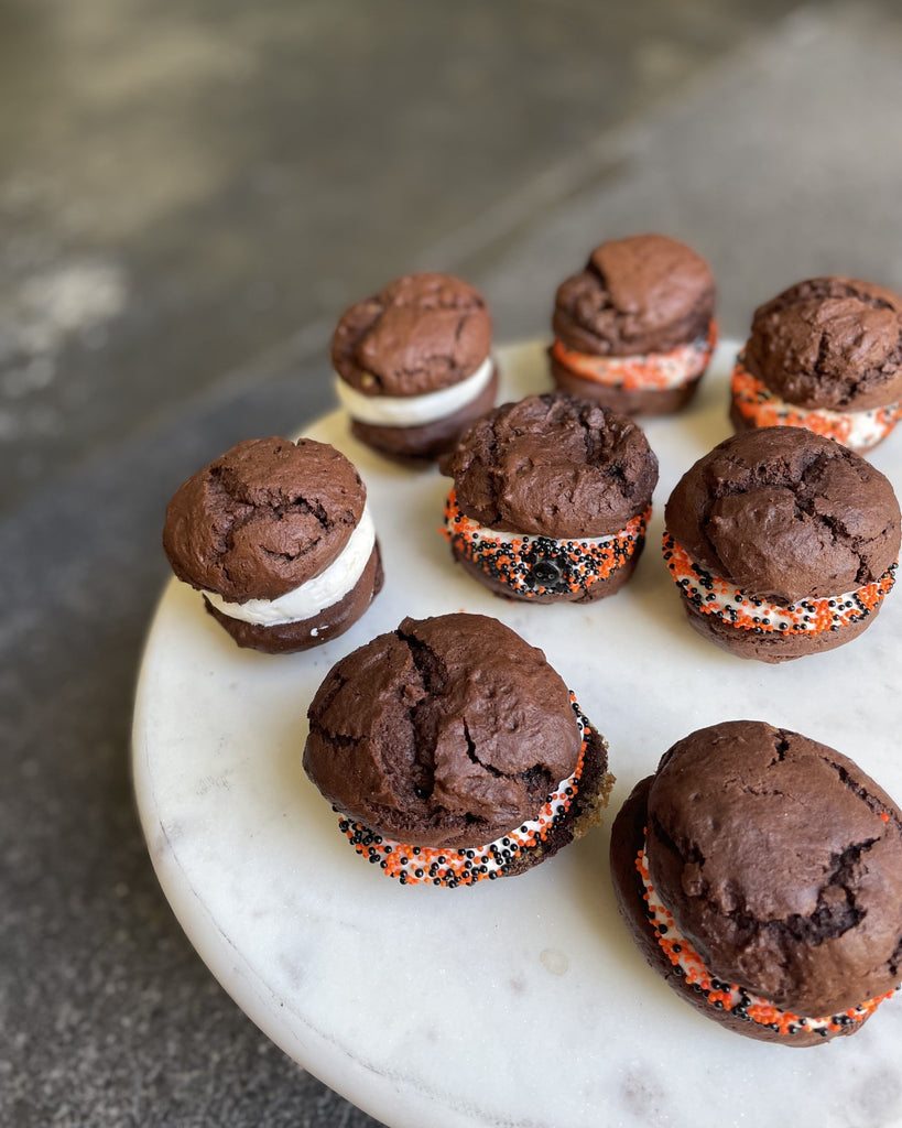 Photo of small snack chocolate cakes filled with salted vanilla bean filling